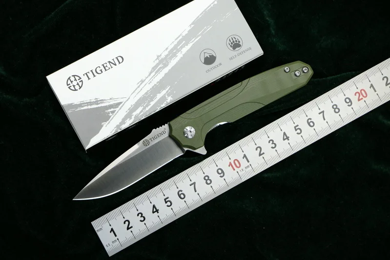 TIGEND CF1818 Tactics folding knife D2 blade G10 + steel handle camping hunting outdoor survival pocket Kitchen knives edc tools
TIGEND CF1818 Tactics folding knife D2 blade G10 + steel handle camping hunting outdoor survival pocket Kitchen knives edc tools