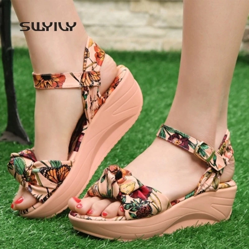 SWYIVY Sneakers Women Slimming Swing Sandals Floral Platform 2018 Summer Soft Heel Height Increasing Female Beach Toning Shoes
SWYIVY Sneakers Women Slimming Swing Sandals Floral Platform 2018 Summer Soft Heel Height Increasing Female Beach Toning Shoes