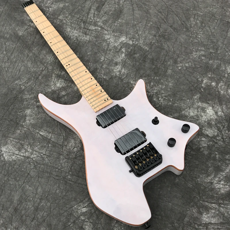 Grote Headless Electric Guitar with Transparent White veneer Koa top, Gloss finish, Black Hardware, Real Photo showing
Grote Headless Electric Guitar with Transparent White veneer Koa top, Gloss finish, Black Hardware, Real Photo showing