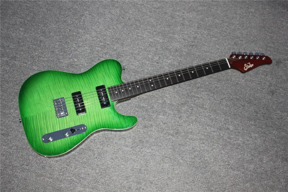 Green GROTE TL style electric guitar chrome hardware, single cutaway, 2xBlack P90 pickup Free shipping direct from factory
Green GROTE TL style electric guitar chrome hardware, single cutaway, 2xBlack P90 pickup Free shipping direct from factory