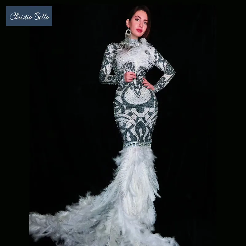 New Elegant Women Rhinestone Crystals Evening Long Dress Bodycon Feather Mermaid Dress Vintage Singer Stage Prom Maxi Dress
New Elegant Women Rhinestone Crystals Evening Long Dress Bodycon Feather Mermaid Dress Vintage Singer Stage Prom Maxi Dress