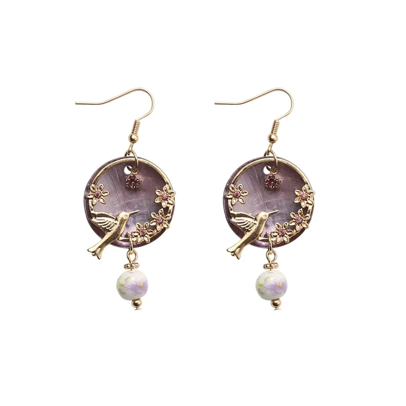 Natural mother of pearl earrings for women aretes bijoux femme, vintage gold color flower bird drop earrings woman shell jewelry 
Natural mother of pearl earrings for women aretes bijoux femme, vintage gold color flower bird drop earrings woman shell jewelry