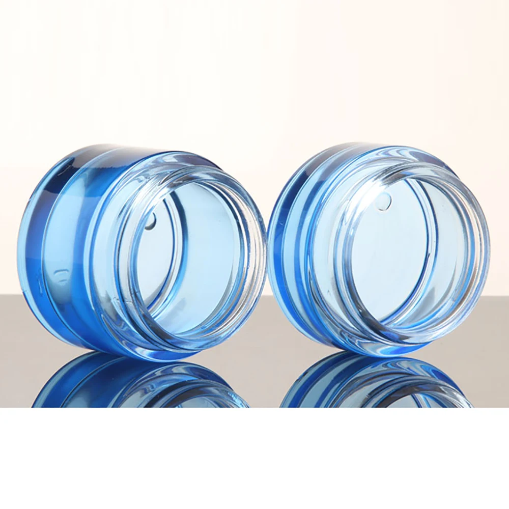 China manufacture blue 50g glass cream jar with silver and golden lid, empty 50g makeup face cream bottle
China manufacture blue 50g glass cream jar with silver and golden lid, empty 50g makeup face cream bottle