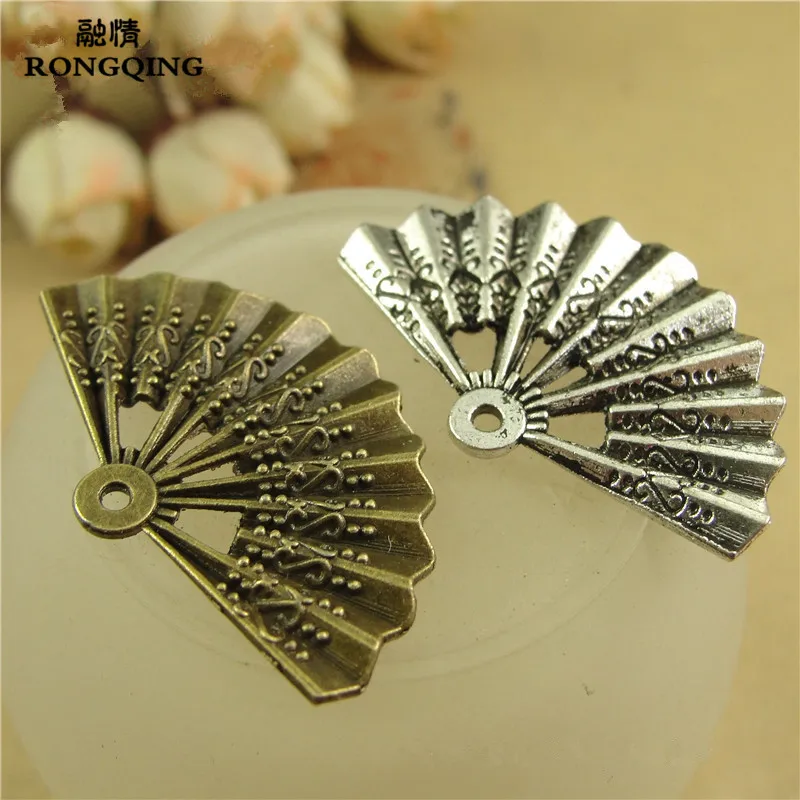 RONGQING 60pcs/lot Vintage Fan Charms Retro Handmade Lady Pendant 33*21MM Jewelry Findings
RONGQING 60pcs/lot Vintage Fan Charms Retro Handmade Lady Pendant 33*21MM Jewelry Findings