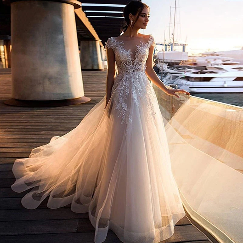 Boho Beach Wedding Dress O-Neck Lace Appliques Top Vintage Princess Wedding Gown Cap Sleeve Simple Bride Dress Vestido De Novia
Boho Beach Wedding Dress O-Neck Lace Appliques Top Vintage Princess Wedding Gown Cap Sleeve Simple Bride Dress Vestido De Novia