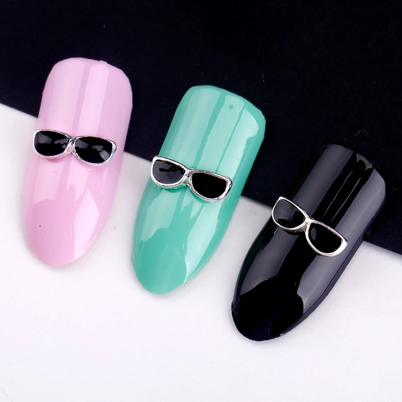 Blueness 10 Pcs/Lot Black Sunglasses 3D Metal Nail Art Decorations DIY Silver Alloy Studs Supplies
Blueness 10 Pcs/Lot Black Sunglasses 3D Metal Nail Art Decorations DIY Silver Alloy Studs Supplies
