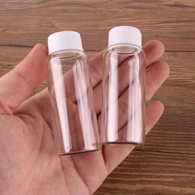 24pcs 27*70mm 25ml Transparent Glass perfume Spice Bottles Container with White Plastic Screw lid Tiny Jar Vials DIY Craft
24pcs 27*70mm 25ml Transparent Glass perfume Spice Bottles Container with White Plastic Screw lid Tiny Jar Vials DIY Craft