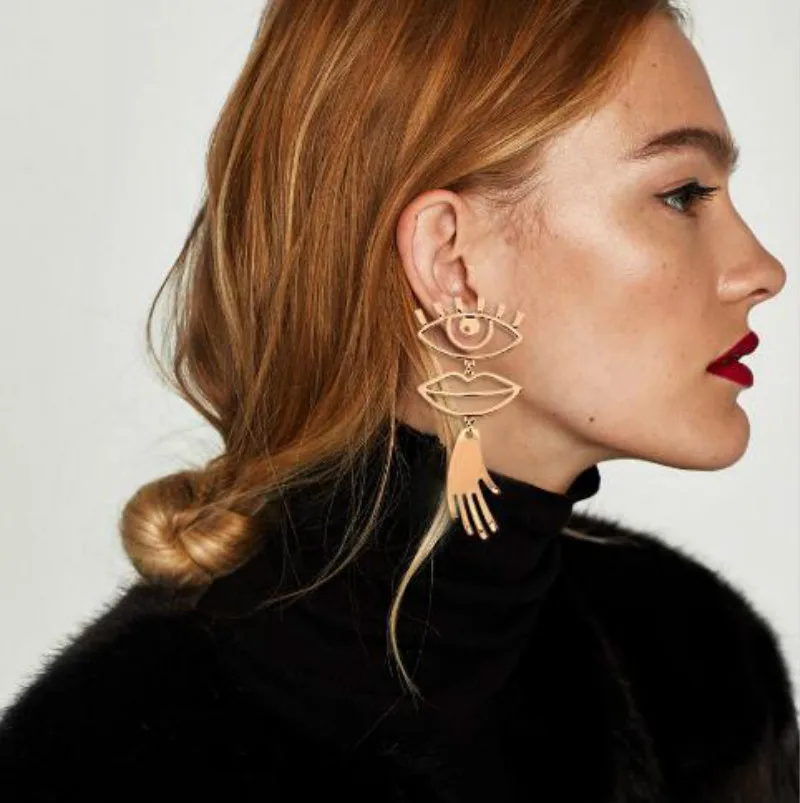 European cross-border fashion jewelry taste eyes and lips pierced earrings design stitching funny alloy earrings
European cross-border fashion jewelry taste eyes and lips pierced earrings design stitching funny alloy earrings