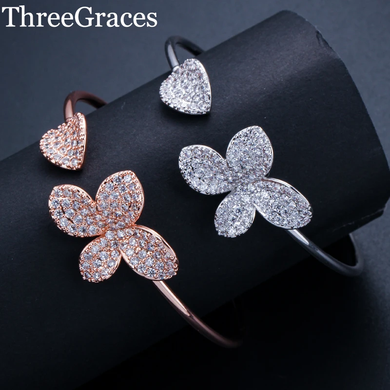 ThreeGraces Luxury Brand Design Zirconia Full Pave Setting Big Leaf Flower Shape Open Hand Cuff Bangle For Women Accessor BA024
ThreeGraces Luxury Brand Design Zirconia Full Pave Setting Big Leaf Flower Shape Open Hand Cuff Bangle For Women Accessor BA024