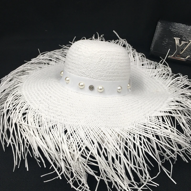 Spring, summer, large straw hat brim natural boundary holiday beach hat female fashion pearl white hat straw temperament
Spring, summer, large straw hat brim natural boundary holiday beach hat female fashion pearl white hat straw temperament