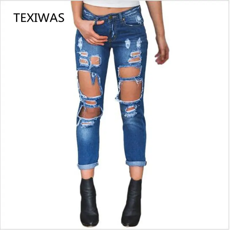 TEXAS 2018 spring and autumn new tearing jeans lady casual fashion buckle personalized beggars high waist Slim stretch pants 
TEXAS 2018 spring and autumn new tearing jeans lady casual fashion buckle personalized beggars high waist Slim stretch pants
