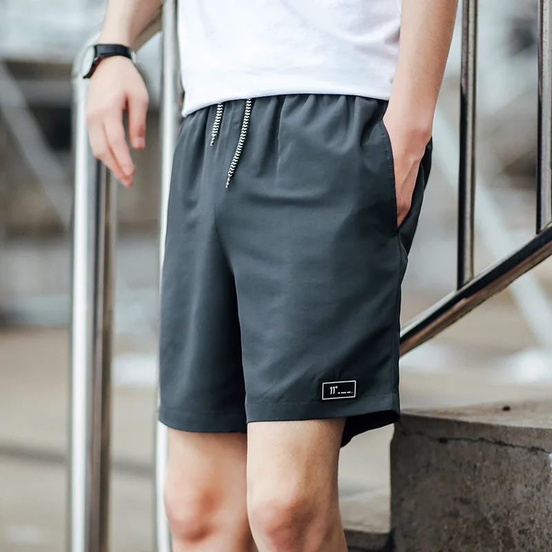 2019 New Men Causal Shorts Loose Student Half Shorts Drawstring Man Pants Sandy Beach Male Boy Cool Summer Outside Sport Running
2019 New Men Causal Shorts Loose Student Half Shorts Drawstring Man Pants Sandy Beach Male Boy Cool Summer Outside Sport Running