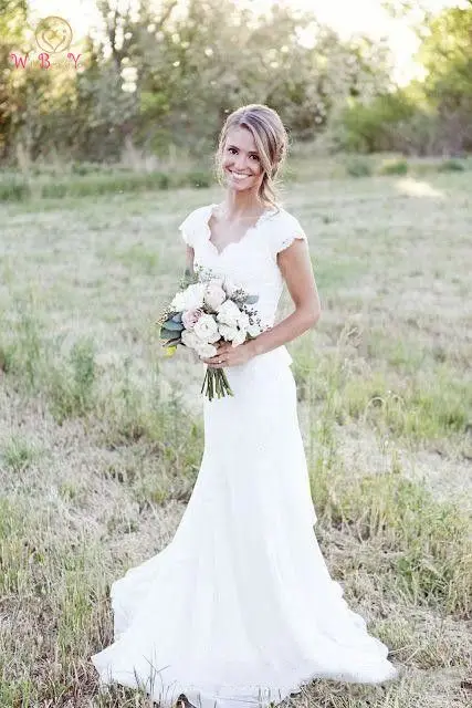 White Ivory 2019 Wedding Dress Lace Buttons V Neck Appliques Lace Short Sleeves Sweep Train Long Robe Femme Simple Bridal Gown
White Ivory 2019 Wedding Dress Lace Buttons V Neck Appliques Lace Short Sleeves Sweep Train Long Robe Femme Simple Bridal Gown