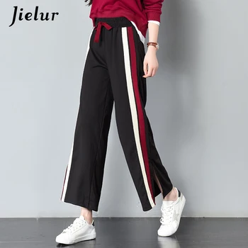 Jielur 2020 Fall Split Spell Color Sweatpants Side Stripe Elastic Waist Straight Women Pants Korean Casual Capris Pantalones 2XL
Jielur 2020 Fall Split Spell Color Sweatpants Side Stripe Elastic Waist Straight Women Pants Korean Casual Capris Pantalones 2XL