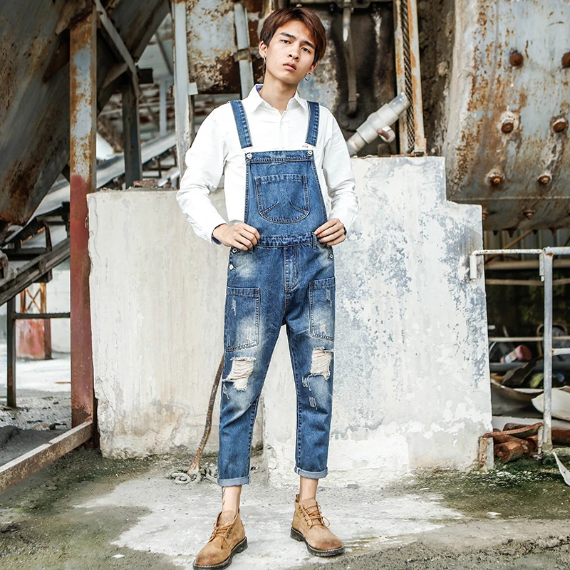 Spring and Summer trend Siamese Sling jeans Men's Japanese Retro Hole Nine pants Men's Korean version of Tooling bib 
Spring and Summer trend Siamese Sling jeans Men's Japanese Retro Hole Nine pants Men's Korean version of Tooling bib