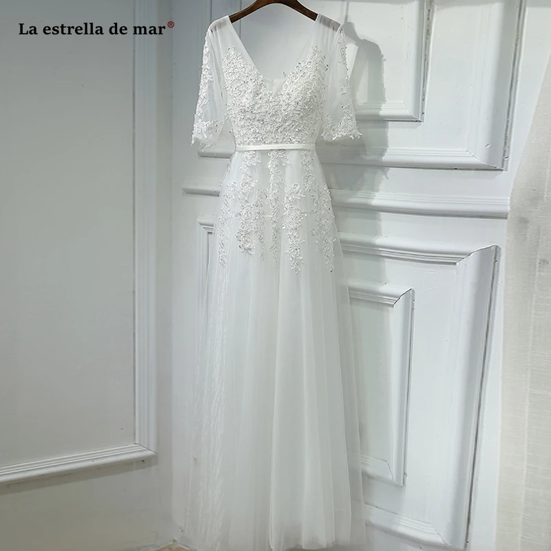 vestido de noiva 2021 new tulle beaded sexy V neck Half sleeve A Line ivory boho wedding dress long robe de mariee
vestido de noiva 2021 new tulle beaded sexy V neck Half sleeve A Line ivory boho wedding dress long robe de mariee