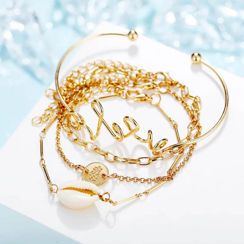 4pcs/set Gold Color Charm Bracelet Fashion Pineapple Shell Pendant Open Bangles Chain Bracelets Sets for Women Girls Jewelry
4pcs/set Gold Color Charm Bracelet Fashion Pineapple Shell Pendant Open Bangles Chain Bracelets Sets for Women Girls Jewelry