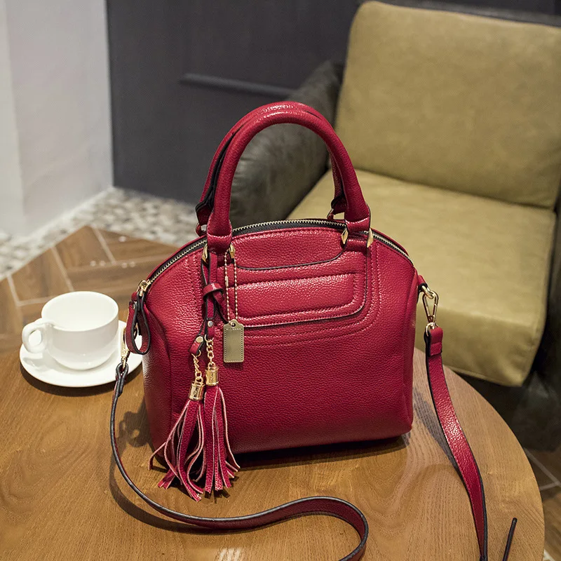European and American Style Famous Brands Tassels Women's Genuine Leather Handbags Women Shoulder Crossbody Bag Shell Bag Ladies
European and American Style Famous Brands Tassels Women's Genuine Leather Handbags Women Shoulder Crossbody Bag Shell Bag Ladies