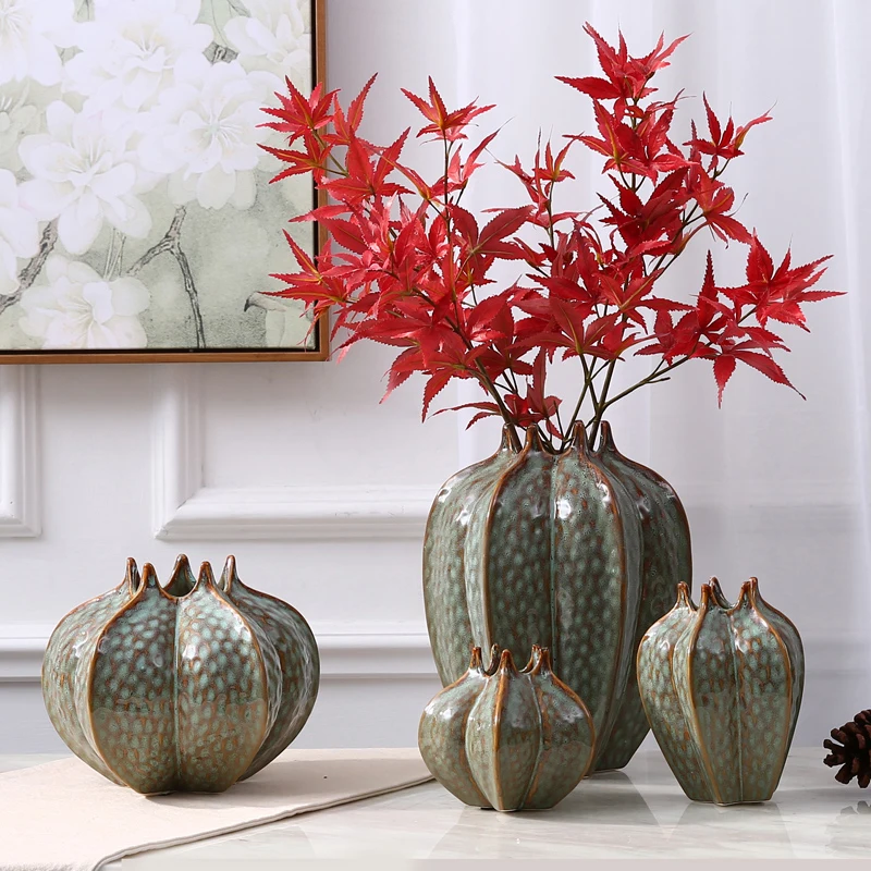 Modern Ceramic vase High quality Creativity Dried flowers containers Tabletop Carambola shape vase home wedding decoration
Modern Ceramic vase High quality Creativity Dried flowers containers Tabletop Carambola shape vase home wedding decoration