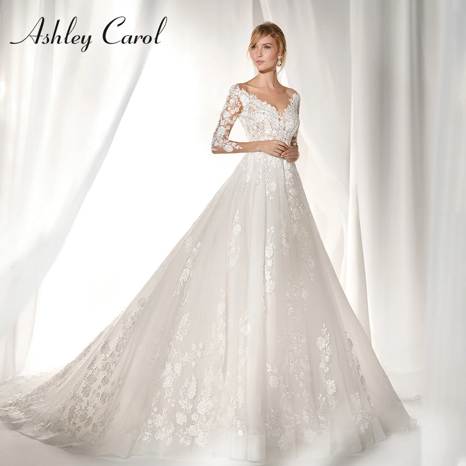 Ashley Carol Sexy V-neckline Long Sleeve Vintage Wedding Dress 2019 New Backless Bride Dress Court Train Illusion Wedding Gowns
Ashley Carol Sexy V-neckline Long Sleeve Vintage Wedding Dress 2019 New Backless Bride Dress Court Train Illusion Wedding Gowns