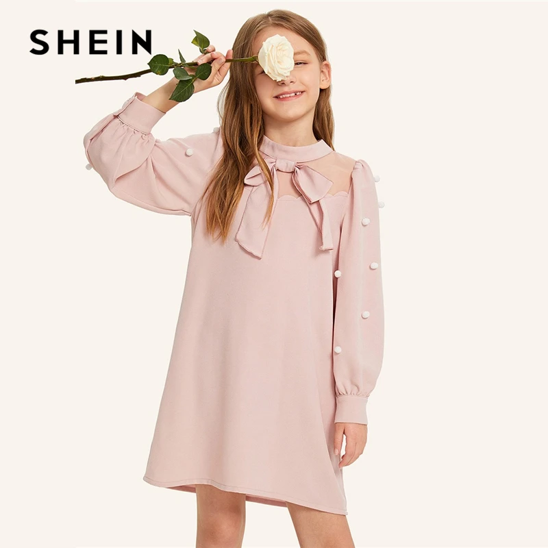 

SHEIN Kiddie Pink Mesh Insert Bow Front Pearls Girls Cute Pompom Dress 2019 Stand Collar Bishop Sleeve Party Kids Tunic Dresses