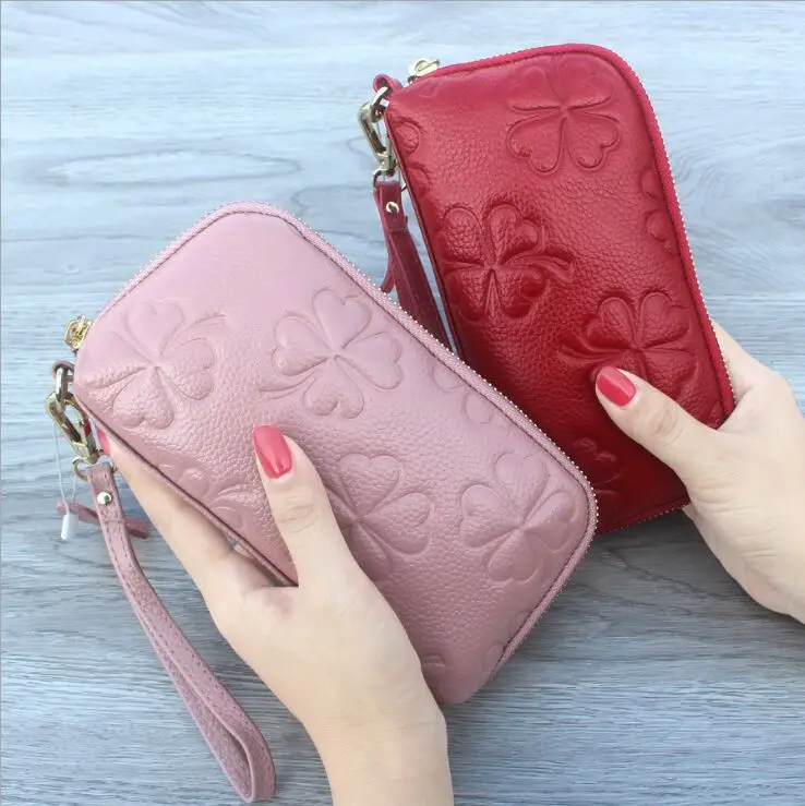 Genuine Leather Clutch bag New Fashion with Coins pocket Phone case Cards holders and Key rings
Genuine Leather Clutch bag New Fashion with Coins pocket Phone case Cards holders and Key rings