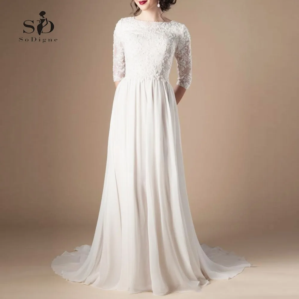 Винтажное свадебное платье с полурукавами кружевом и бусинами элегантное