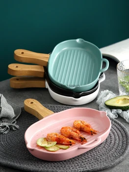 Creative large capacity baking ceramic plate Home kitchen dish with wooden handle flat plate anti-hot black pepper steak plate
Creative large capacity baking ceramic plate Home kitchen dish with wooden handle flat plate anti-hot black pepper steak plate