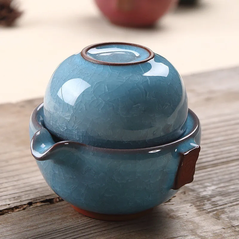 Portable China Kung Fu Tea Set 1 Teapot 1 Cup Travel Teapot Kettle Coffee Cup Ice Crack Glaze Tea Pot Drinkware Tea Cups Gaiwan
Portable China Kung Fu Tea Set 1 Teapot 1 Cup Travel Teapot Kettle Coffee Cup Ice Crack Glaze Tea Pot Drinkware Tea Cups Gaiwan