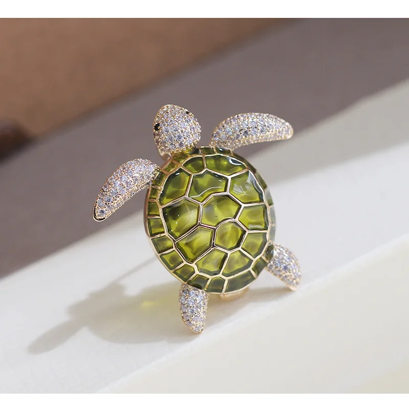 New product cute four-color Epoxy stone inset small turtle brooch male and female models turtle needle pin
New product cute four-color Epoxy stone inset small turtle brooch male and female models turtle needle pin