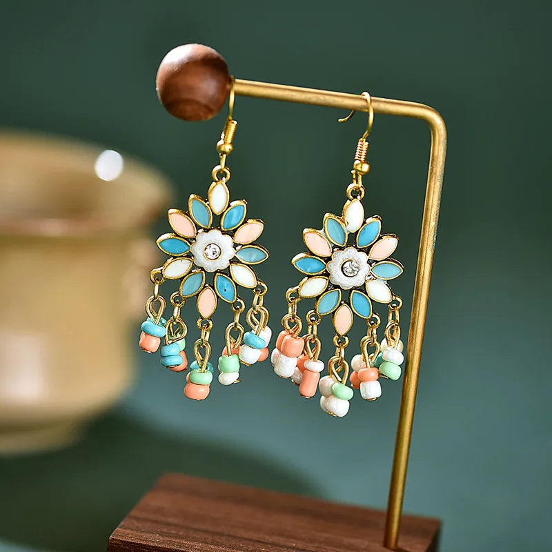 Bohemian Ethnic Flower Ladies Earrings Womens Jhumka Vintage Alloy Carved Beads Tassel Dangle Earrings Indian Jewelry
Bohemian Ethnic Flower Ladies Earrings Womens Jhumka Vintage Alloy Carved Beads Tassel Dangle Earrings Indian Jewelry