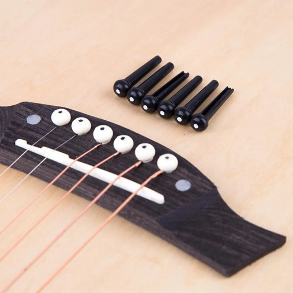 Portable 6-String Acoustic Guitar Bridge Pins Plastic String End Peg Connectors Saddle Nut Cattle Tailpiece Guitar Accessories
Portable 6-String Acoustic Guitar Bridge Pins Plastic String End Peg Connectors Saddle Nut Cattle Tailpiece Guitar Accessories