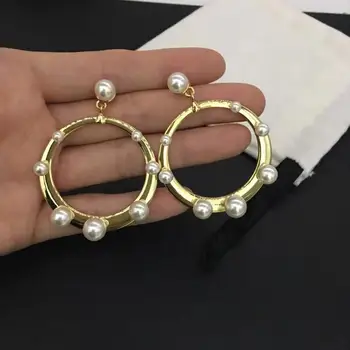 New Korean Version Of The Cold Wind Fairy Temperament Personality Wild Pearl Exaggerated Big Circle Earrings Earrings Earrings
New Korean Version Of The Cold Wind Fairy Temperament Personality Wild Pearl Exaggerated Big Circle Earrings Earrings Earrings