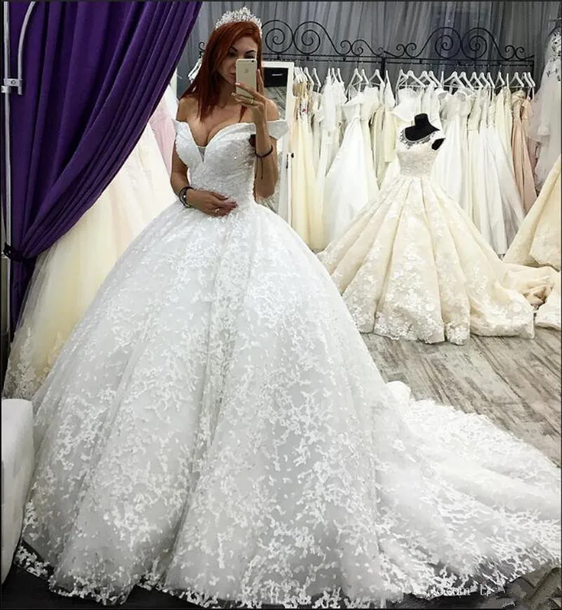 Fabulous Lace Appliques Beads Ball Gown Wedding Dresses 2019 Dubai Arabic Elegant Off Shoulder Ruched Long Train Bridal Gowns 
Fabulous Lace Appliques Beads Ball Gown Wedding Dresses 2019 Dubai Arabic Elegant Off Shoulder Ruched Long Train Bridal Gowns