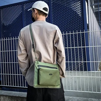 Men and women couple shoulder bag wild messenger bag small street trend postman bag male riding bag 
Men and women couple shoulder bag wild messenger bag small street trend postman bag male riding bag