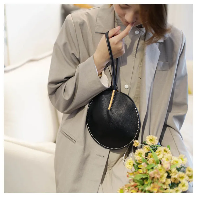 

2024 design Bag for women mobile phone Japanese style retro round original clutch First Layer Leather Cowhide Handmade hand bag