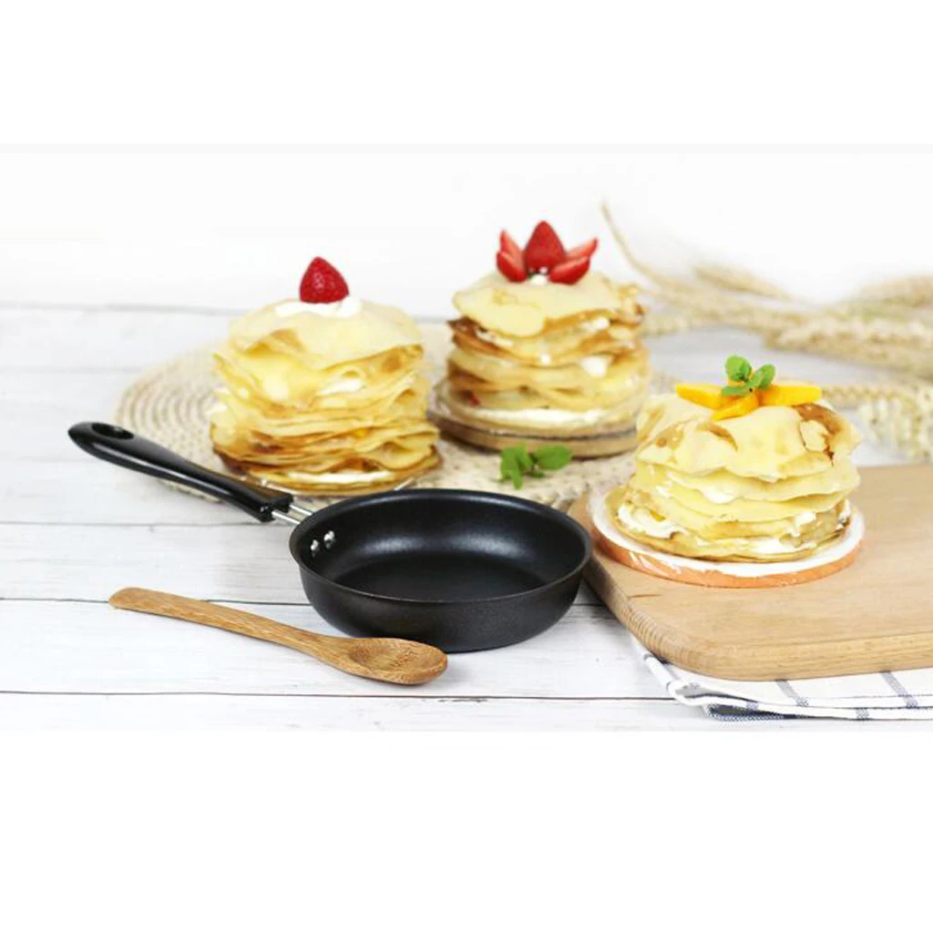 12cm Non Stick Pan Black Small Iron Frying Pan Round Egg Pan Egg Fry Skillet Scratch Resistant Kitchen Cookware 12cm Non Stick Pan Black Small Iron Frying Pan Round Egg Pan Egg Fry Skillet Scratch Resistant Kitchen Cookware
