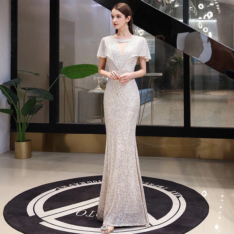 Glitter Sequined Mermaid Cloak Evening Dresses Cap Sleeve V Neck Backless Elegant Party Prom Dress With Jacket Banquet Gown 2020
Glitter Sequined Mermaid Cloak Evening Dresses Cap Sleeve V Neck Backless Elegant Party Prom Dress With Jacket Banquet Gown 2020