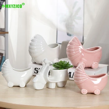 Ceramic Flower Pot Baby Carriage Shape Decoration Succulent Plant Pot Motorcycle Sculpture Crafts Home Decorations Accessories
Ceramic Flower Pot Baby Carriage Shape Decoration Succulent Plant Pot Motorcycle Sculpture Crafts Home Decorations Accessories