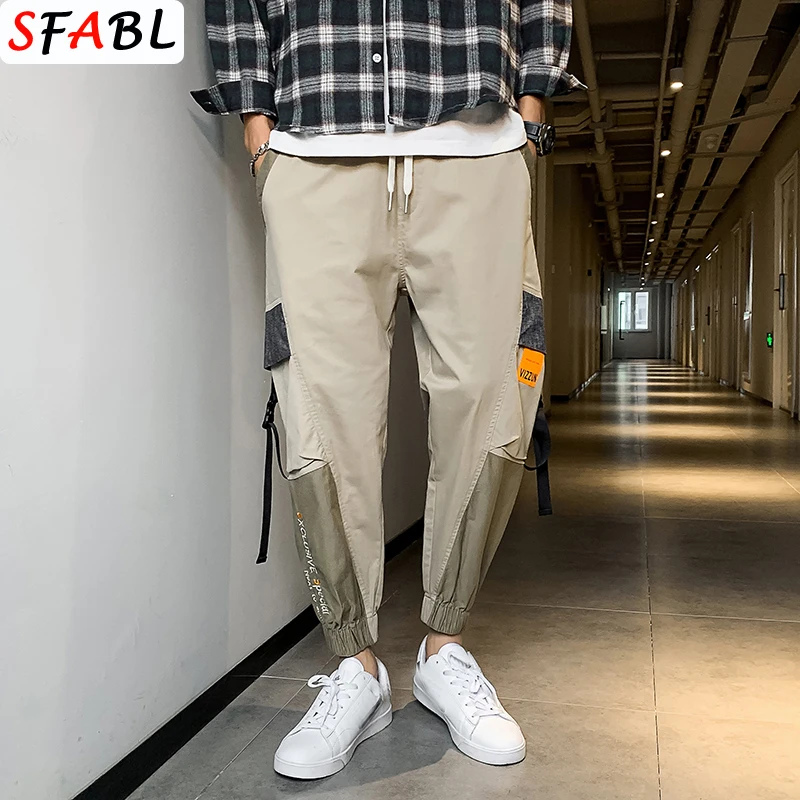 SFABL New Fashion Harajuku Men Pants Autumn Spring Hip Hop Pants Cargo Trousers Ribbons Streetwear Joggers Harem Pants Hombre
SFABL New Fashion Harajuku Men Pants Autumn Spring Hip Hop Pants Cargo Trousers Ribbons Streetwear Joggers Harem Pants Hombre