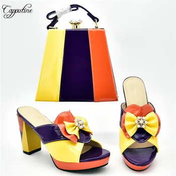 Pretty colorful African lady slip-on shoes with evening handbag set for party 526-1 heel height 10cm
Pretty colorful African lady slip-on shoes with evening handbag set for party 526-1 heel height 10cm