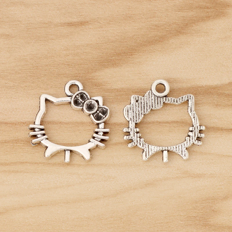 30 Pieces Tibetan Silver Open Cartoon Cat Charms Pendants for Necklace Bracelet Jewellery Making Accessories 18mm 
30 Pieces Tibetan Silver Open Cartoon Cat Charms Pendants for Necklace Bracelet Jewellery Making Accessories 18mm