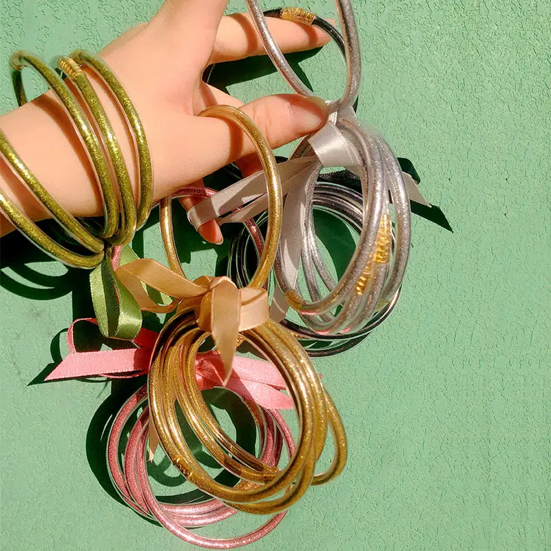 JUST FEEL Multi-layer Glitter Jelly Bangle Bracelet Set Multicolor All Weather Silicone Plastic with Gold Powder Glitter Bangles
JUST FEEL Multi-layer Glitter Jelly Bangle Bracelet Set Multicolor All Weather Silicone Plastic with Gold Powder Glitter Bangles