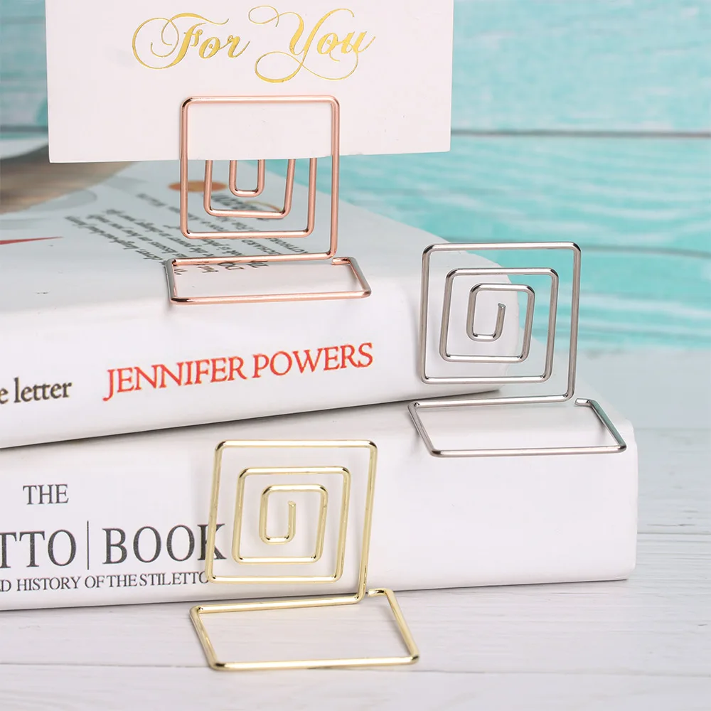 1PC Card Holder Wedding Party Desktop Decor Romantic Heart Ring Shape Photo Clip Table Number Stand Memo Pincer Clamps Stand
1PC Card Holder Wedding Party Desktop Decor Romantic Heart Ring Shape Photo Clip Table Number Stand Memo Pincer Clamps Stand