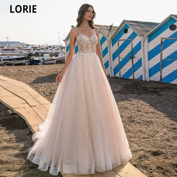 LORIE A-Line Wedding Dresses 2021 Champagne Beach Bridal Gowns Spaghetti Straps Lace Appliques Corset Bride Dress With Lacing 
LORIE A-Line Wedding Dresses 2021 Champagne Beach Bridal Gowns Spaghetti Straps Lace Appliques Corset Bride Dress With Lacing