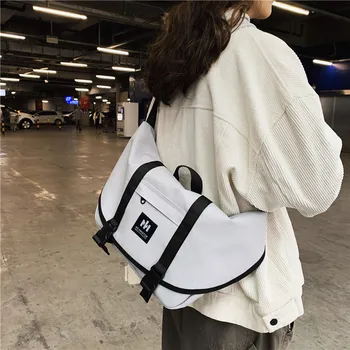 Retro large capacity postman bag buckle messenger bag casual simple fashion portable shoulder bag for men and women
Retro large capacity postman bag buckle messenger bag casual simple fashion portable shoulder bag for men and women