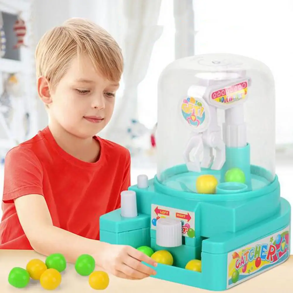 Kids Mini Manual Catching Balls Toy Machine Candy Gripper Interactive Game Children Toy Table Game Simulation catching ball toys
Kids Mini Manual Catching Balls Toy Machine Candy Gripper Interactive Game Children Toy Table Game Simulation catching ball toys