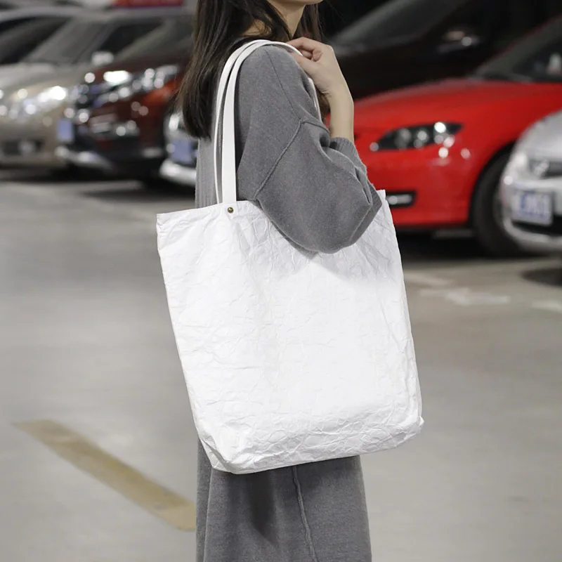 Korean version of the simple retro handbag all-match kraft paper canvas handbags casual distressed DuPont paper shoulder bag
Korean version of the simple retro handbag all-match kraft paper canvas handbags casual distressed DuPont paper shoulder bag
