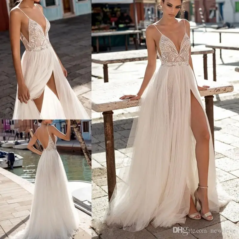Luxury Beach Wedding Dresse Side Split Spaghetti Sexy Illusion Boho A-Line Robes De Mariée Pearls Backless Bohemian Bridal Gowns
Luxury Beach Wedding Dresse Side Split Spaghetti Sexy Illusion Boho A-Line Robes De Mariée Pearls Backless Bohemian Bridal Gowns