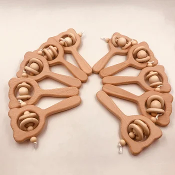 5pcs Wooden Rattle Beech Bear Hand Teething Wood Ring Baby Rattles Play Gym Montessori Stroller Toy Educational Toys teether 
5pcs Wooden Rattle Beech Bear Hand Teething Wood Ring Baby Rattles Play Gym Montessori Stroller Toy Educational Toys teether